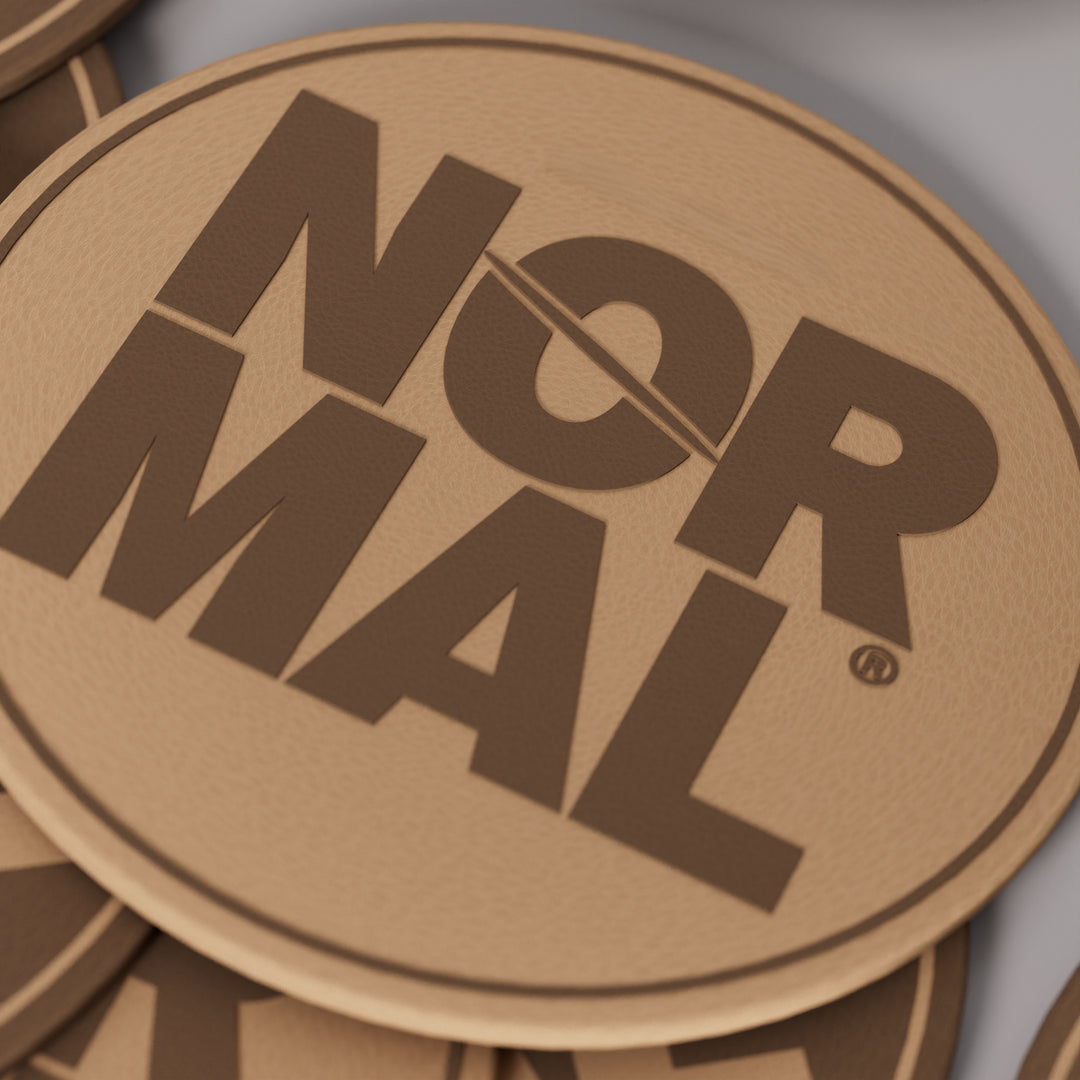 Normal Beverage leather logo patch, 2x2 inch, detail view